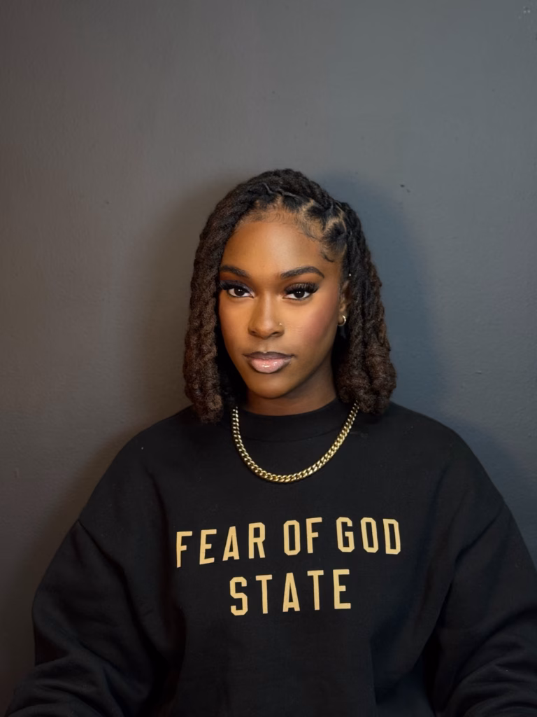 Bob Length Locs With Side Part and Curled Ends