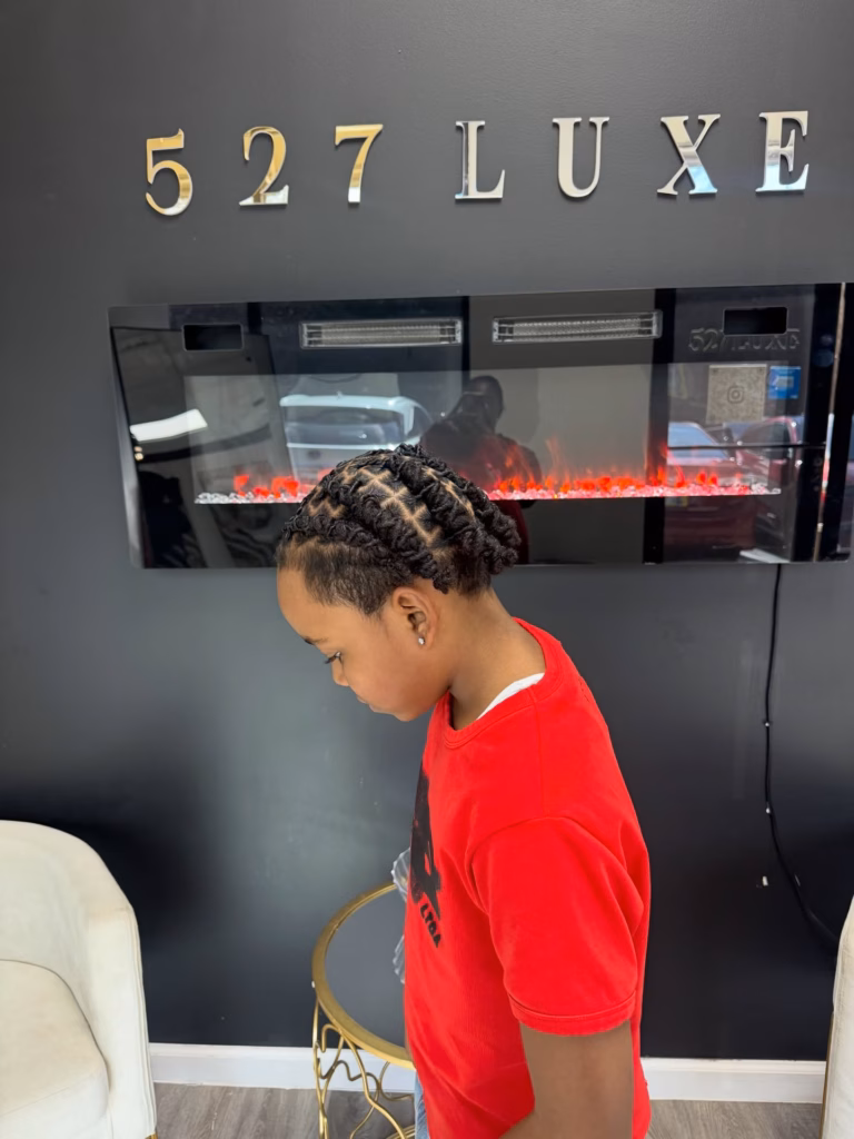 Boy's Short Locs with Faded Sides and Neat Grid Top