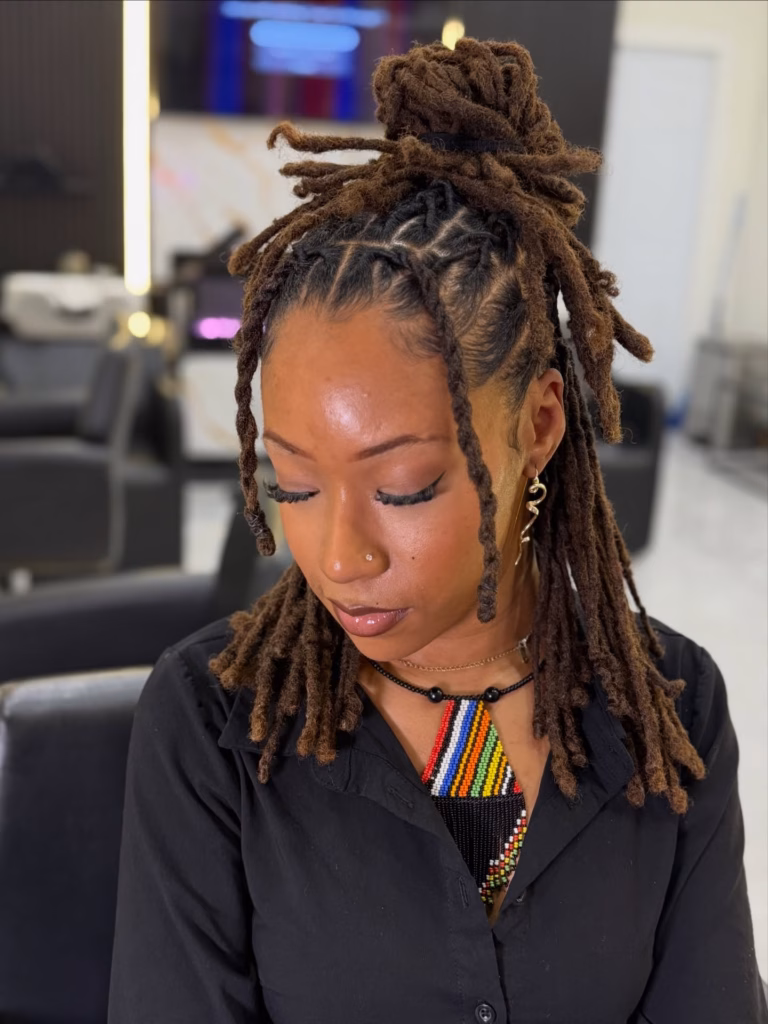 Brown Locs Half-Up Bun With Cornrow Base