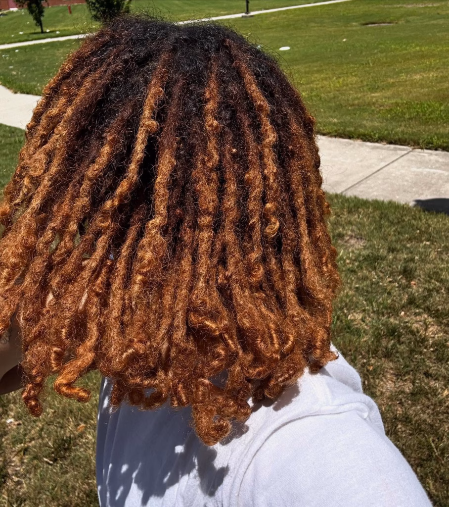 Copper Ginger Locs with Defined Spiral Curly Ends