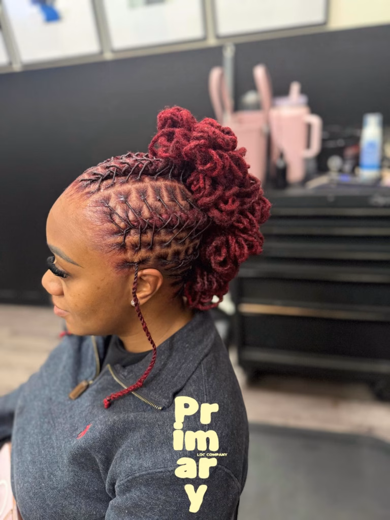 Crimson Red Locs With Interlocked Updo and Trailing Strand