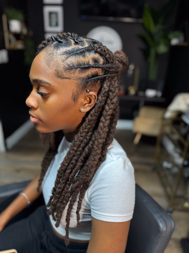 Dark Brown Half-Up Loc Bun With Diagonal Part Design