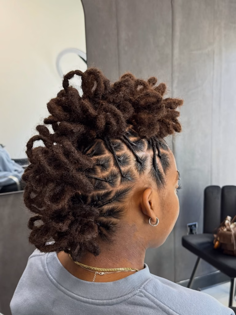 Dark Brown Loc Mohawk Updo With Curled Ends