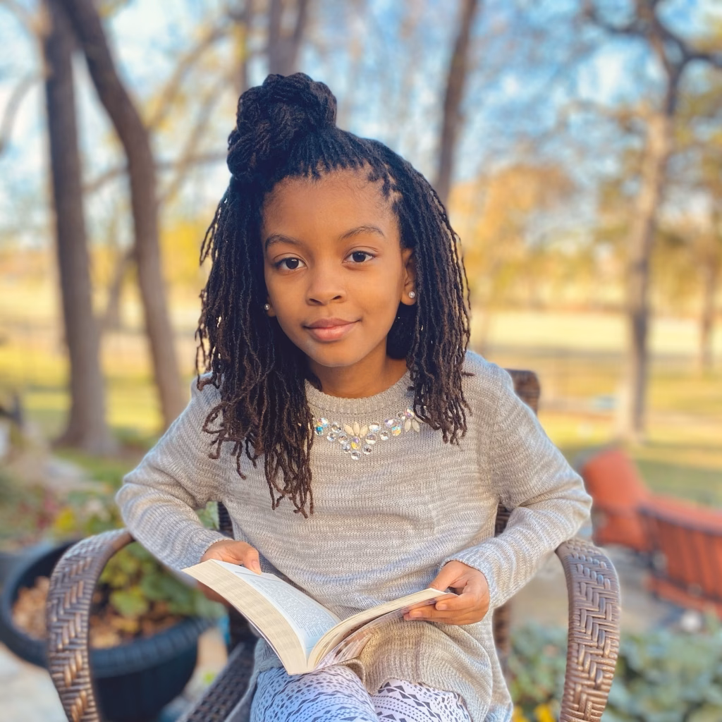 Half-Up Loc Top Knot with Loose Flowing Locs and Pearl Studs