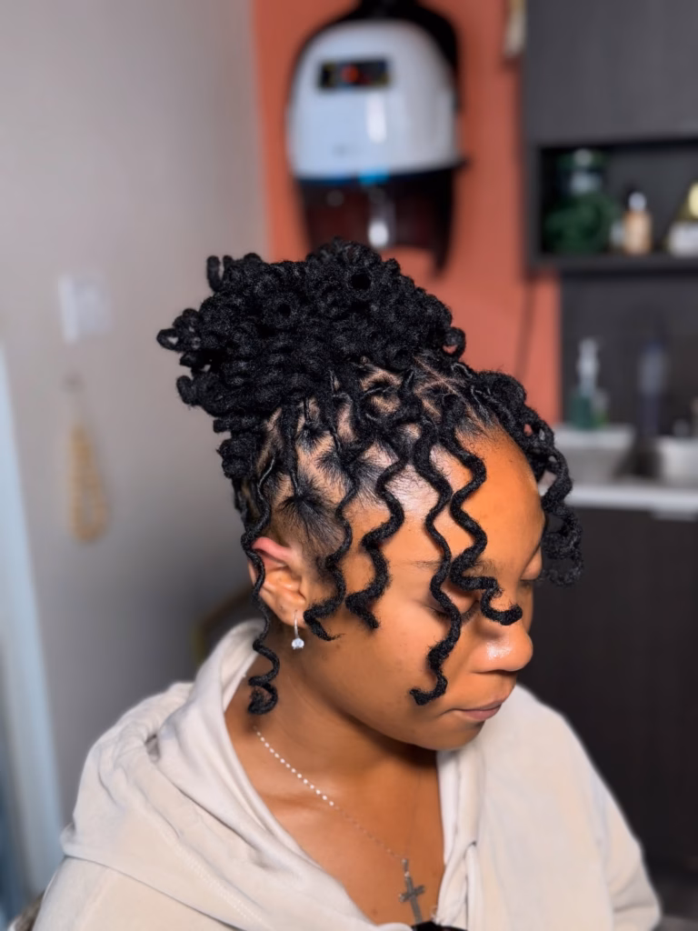 High Loc Bun with Spiral Tendril Edges