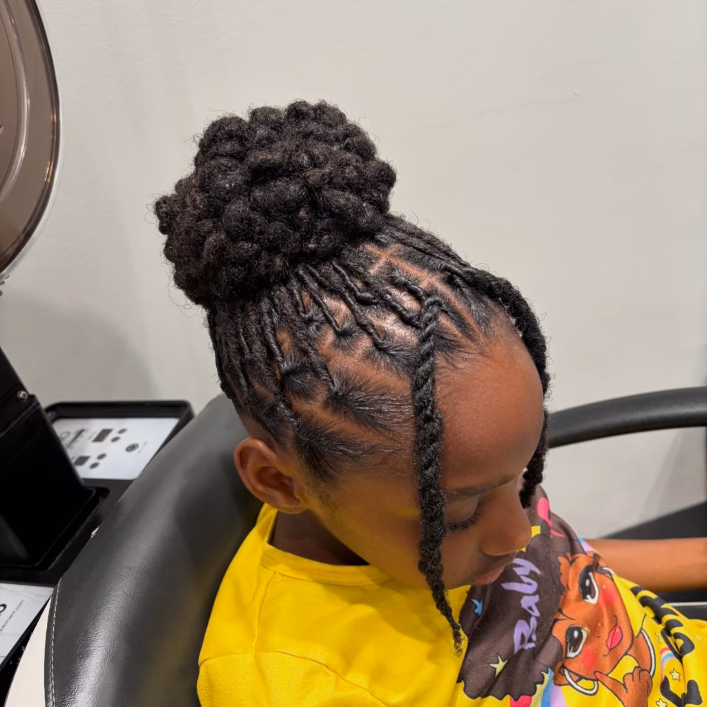 High Loc Bun with Zigzag Parted Crown and Hanging Tendrils