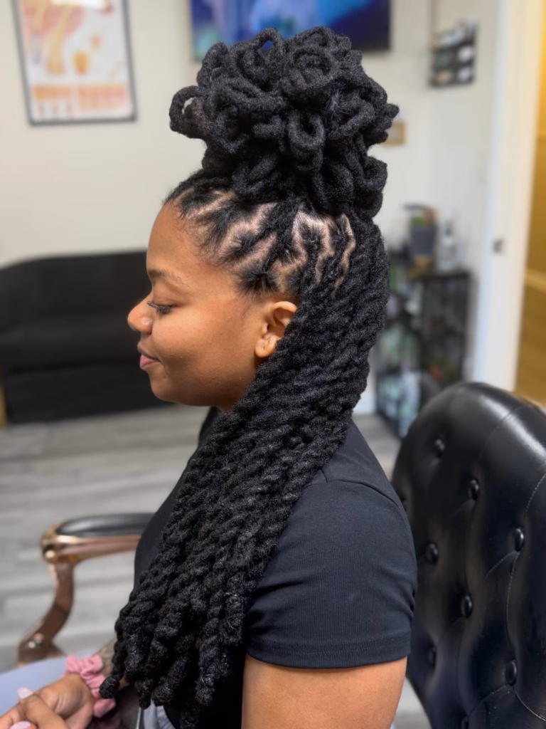 Jet Black Half-Up Looped Bun with Flowing Thick Locs
