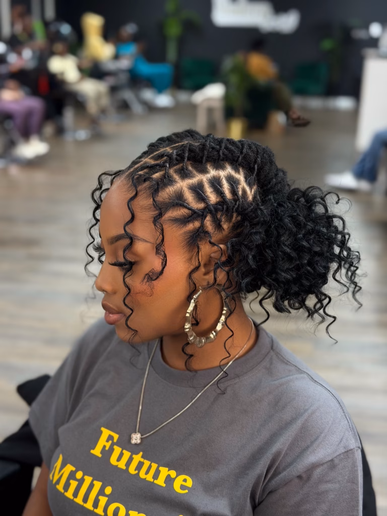 Loc Updo With Curly Ends and Star Part Design