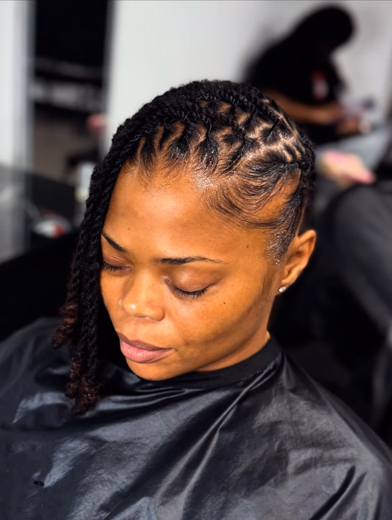 Locs Swept to One Side with Laid Edges