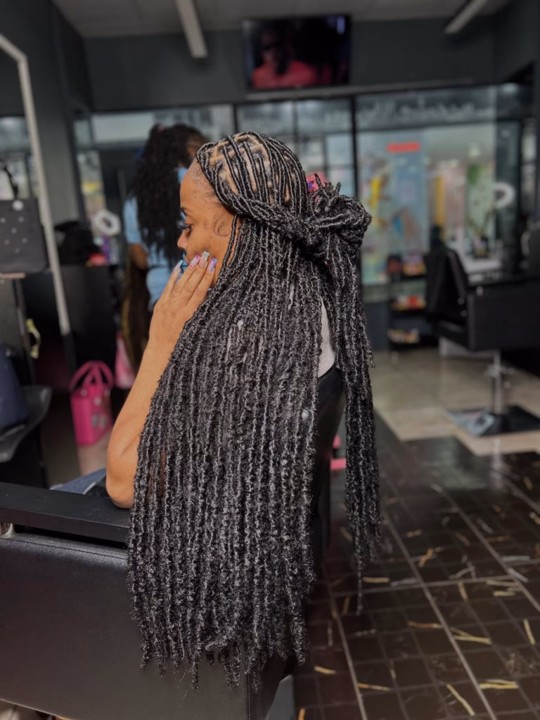 Long Black Faux Locs Half-Up Bow Style