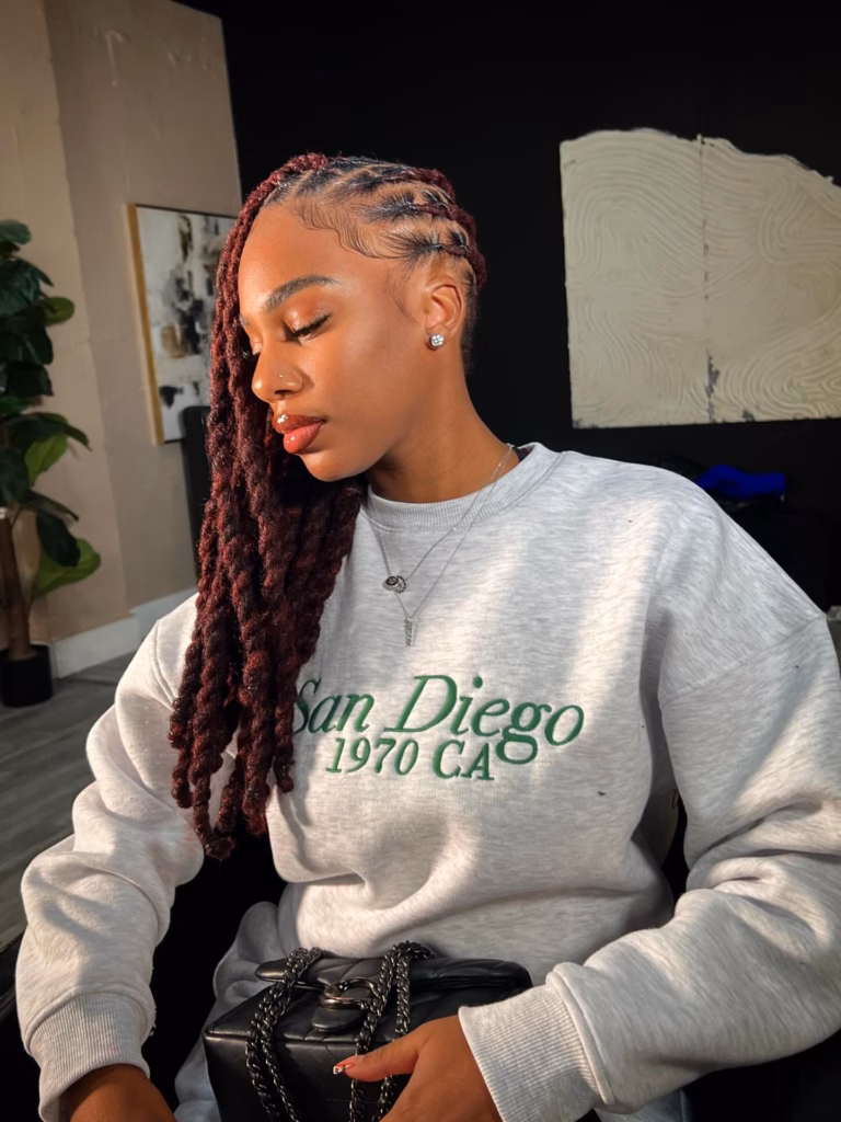 Long Burgundy Locs With Cornrow Crown and Side Sweep