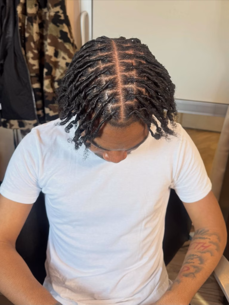 Older Teen's Medium Locs with Curly Tips and Grid Parts