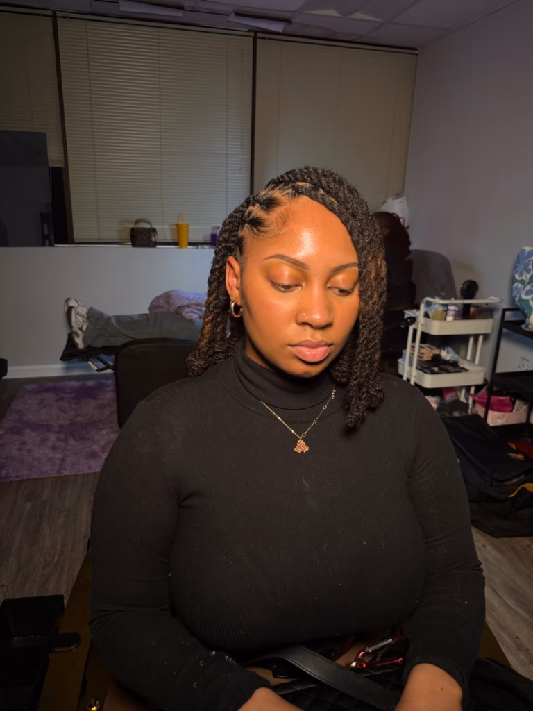 Short Twisted Locs Worn Loose with Gold Pendant Necklace