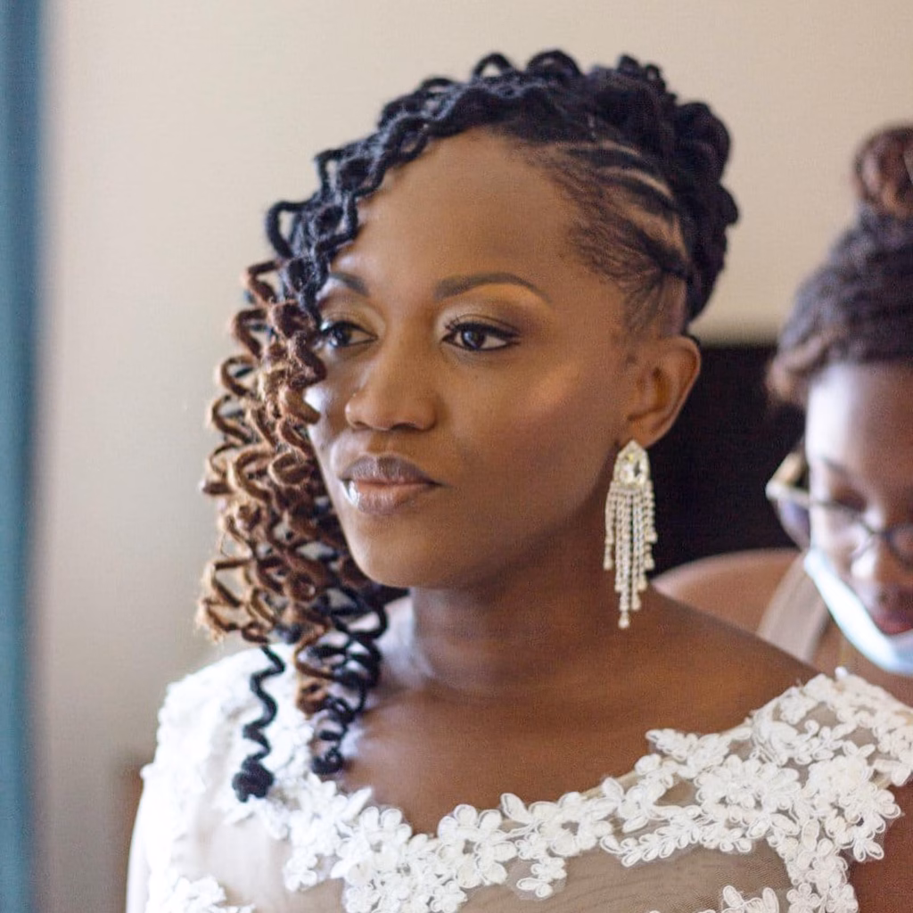  Side-Swept Curly Locs with Flat Crown and Crystal Chandelier Earrings