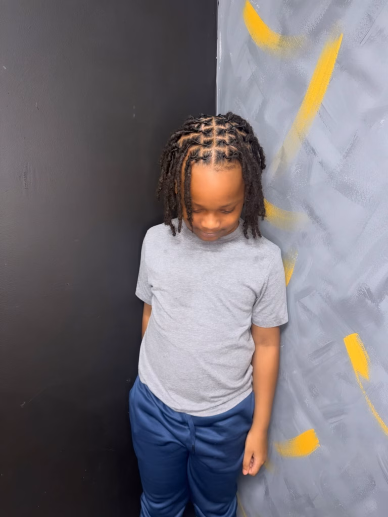 Young Boy's Shoulder Length Locs with Grid Parts and Loose Ends