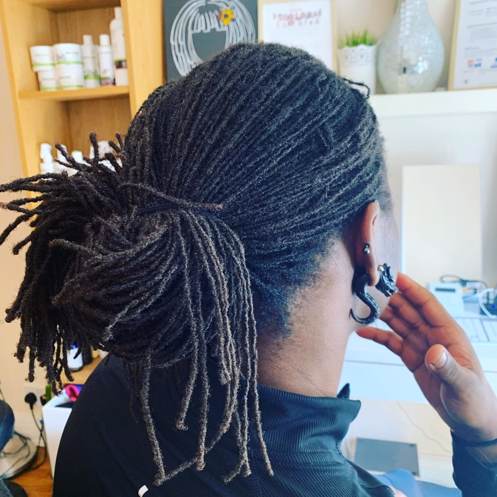 Low Sisterlocks Ponytail with Undercut