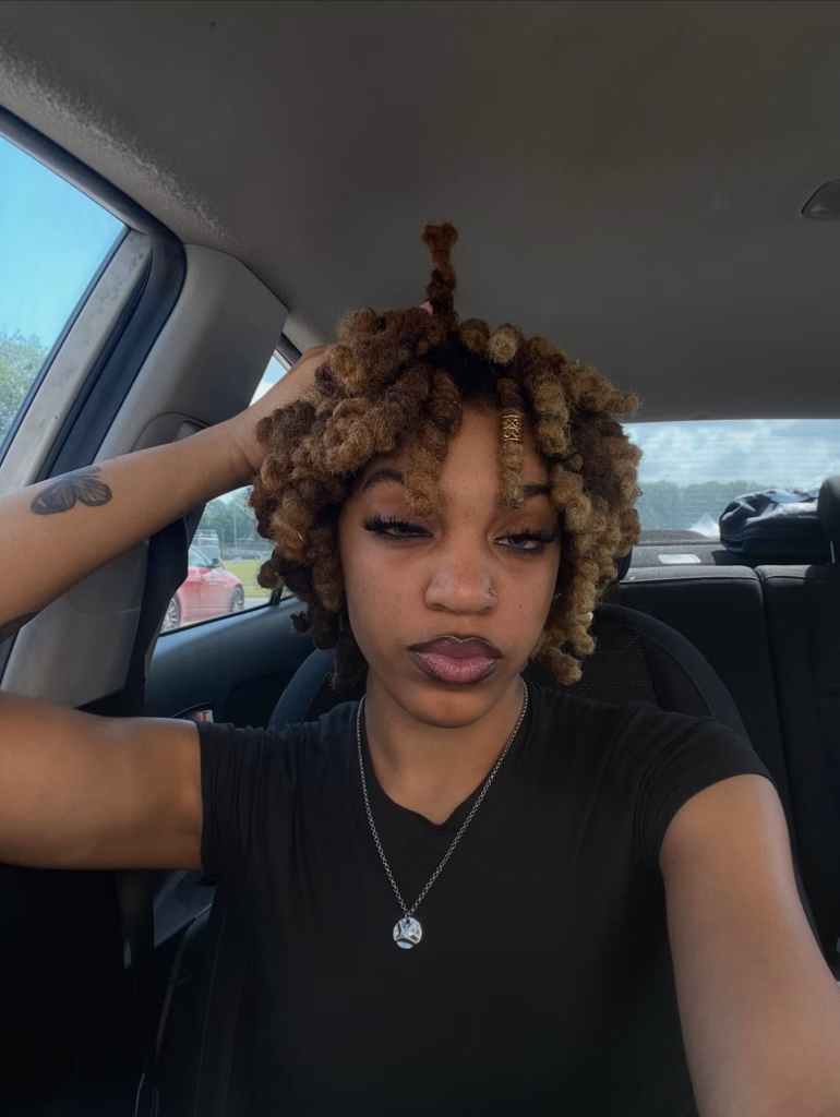 Honey Brown Short Looped Locs with Gold Cuff Accent
