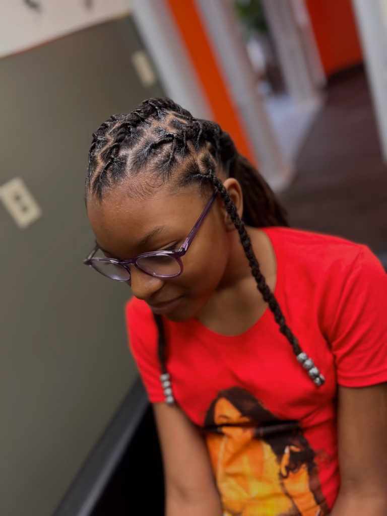 Flat Twisted Crown With Long Twisted Loc Ponytail and Silver Beads
