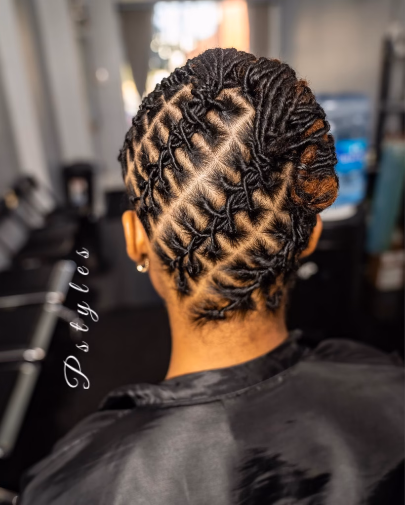 Full Diamond Weave Updo with Side-Pinned Bun and Auburn Accent