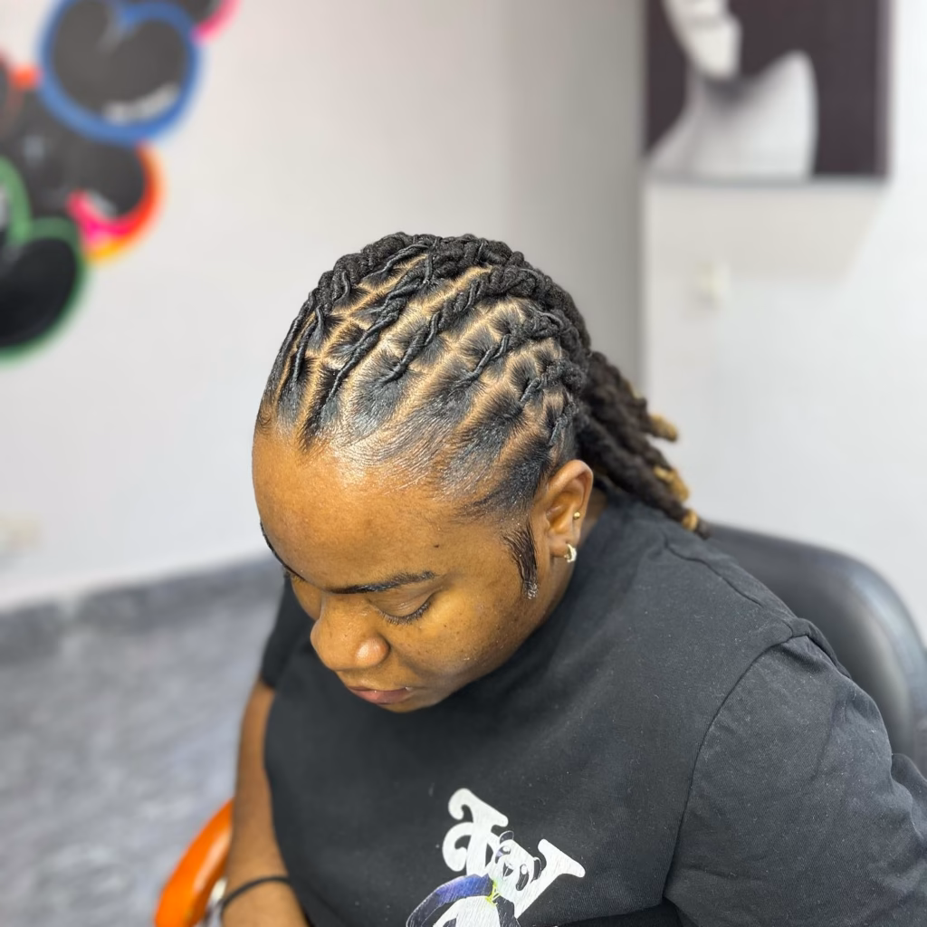 Full Flat Twist Updo with Loc Ends Swept to One Side