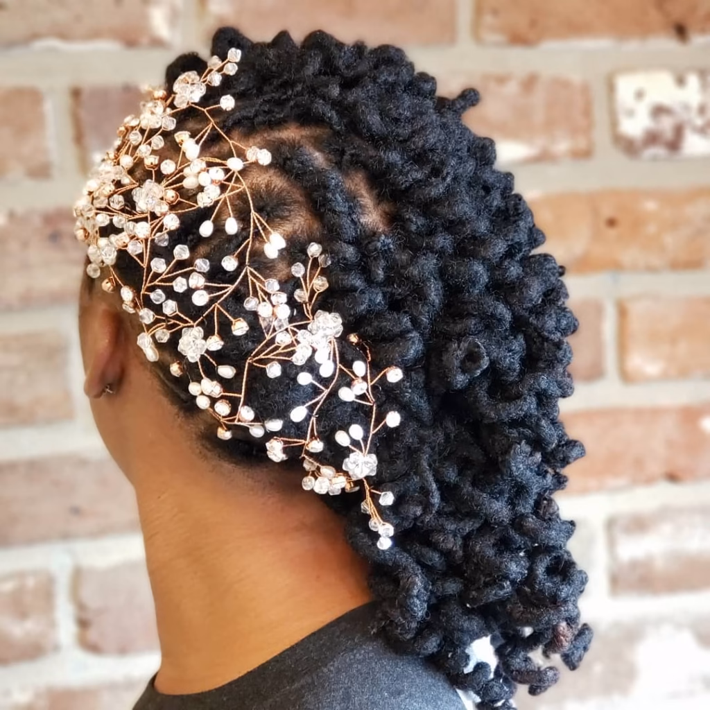 Half-Up Coiled Loc Style with Rose Gold Crystal Vine Draped Across the Side