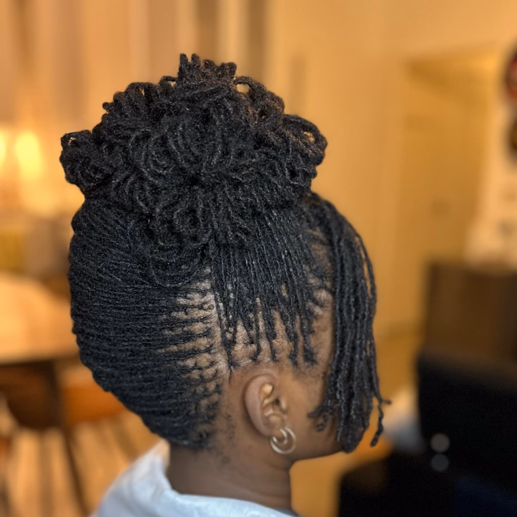 High Sisterlock Updo With Coiled Crown and Flat-Twisted Nape