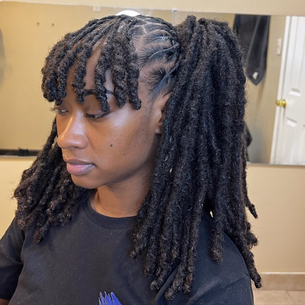 Loc Pigtails With Curly Bangs.