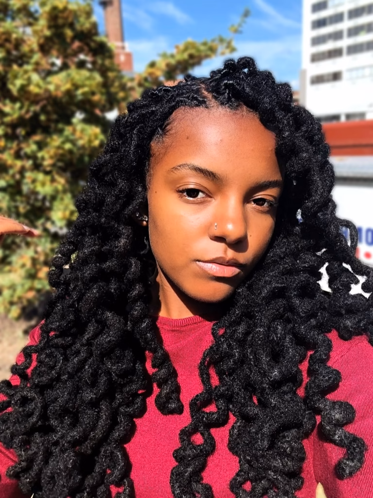 Long Freeform Locs with Chunky Coiled Ends Worn Down