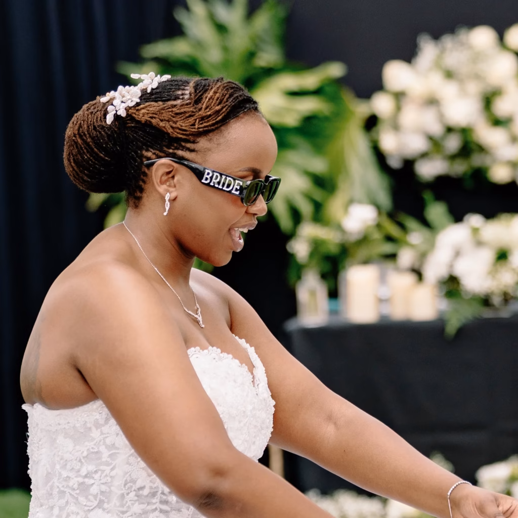 Medium Loc Low Bun with Honey Ombre and Pearl Flower Clip
