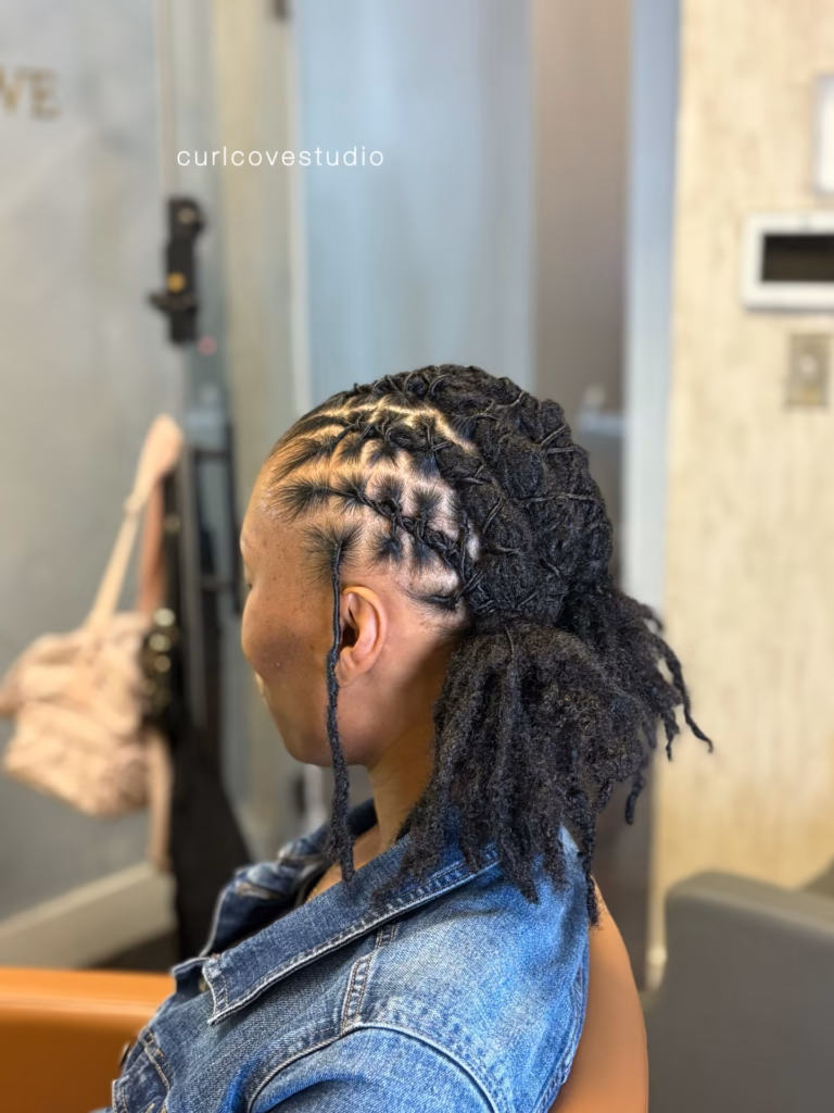 Pinned Mohawk Locs with Loose Tendrils