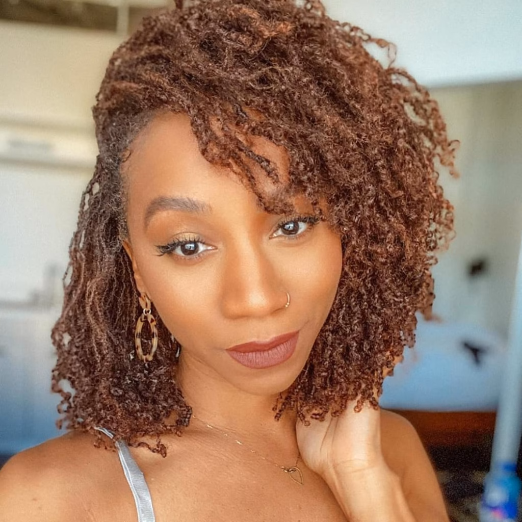 Short Freeform Locs with Copper-Brown Color and Volume