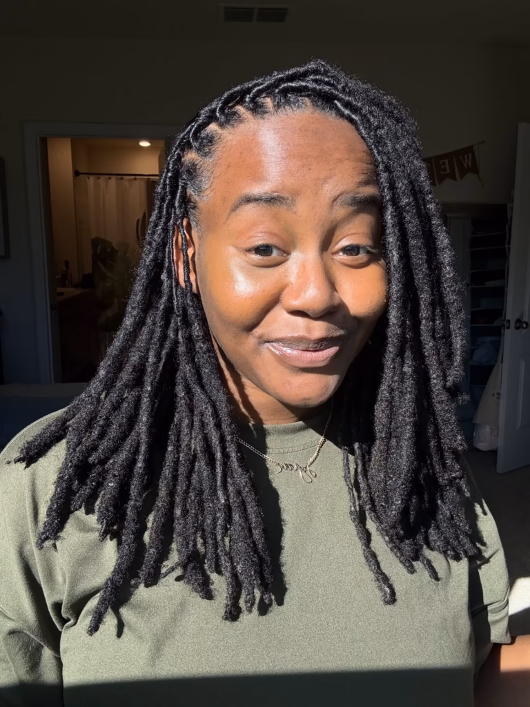 Thick Mature Locs Worn Loose with a Name Necklace