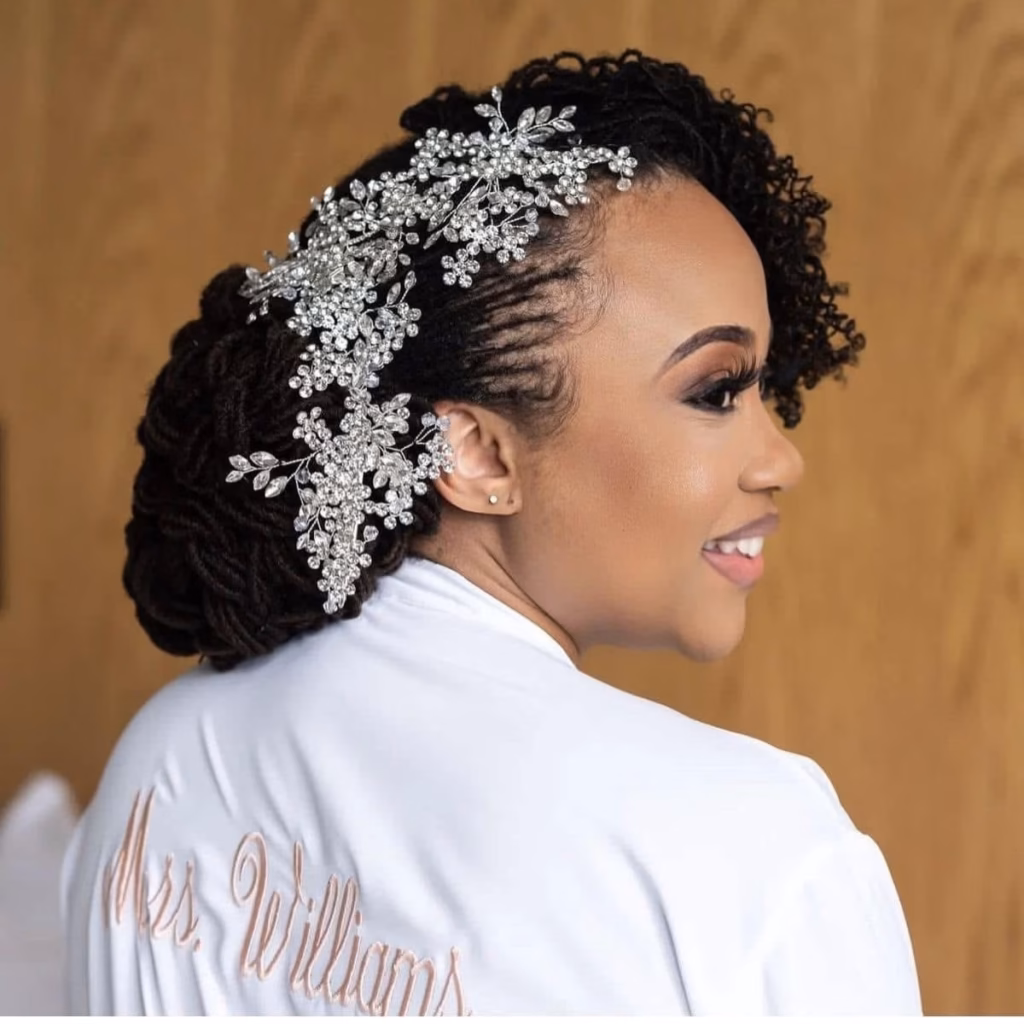 Crystal Side-Swept Loc Bun With Curly Bangs