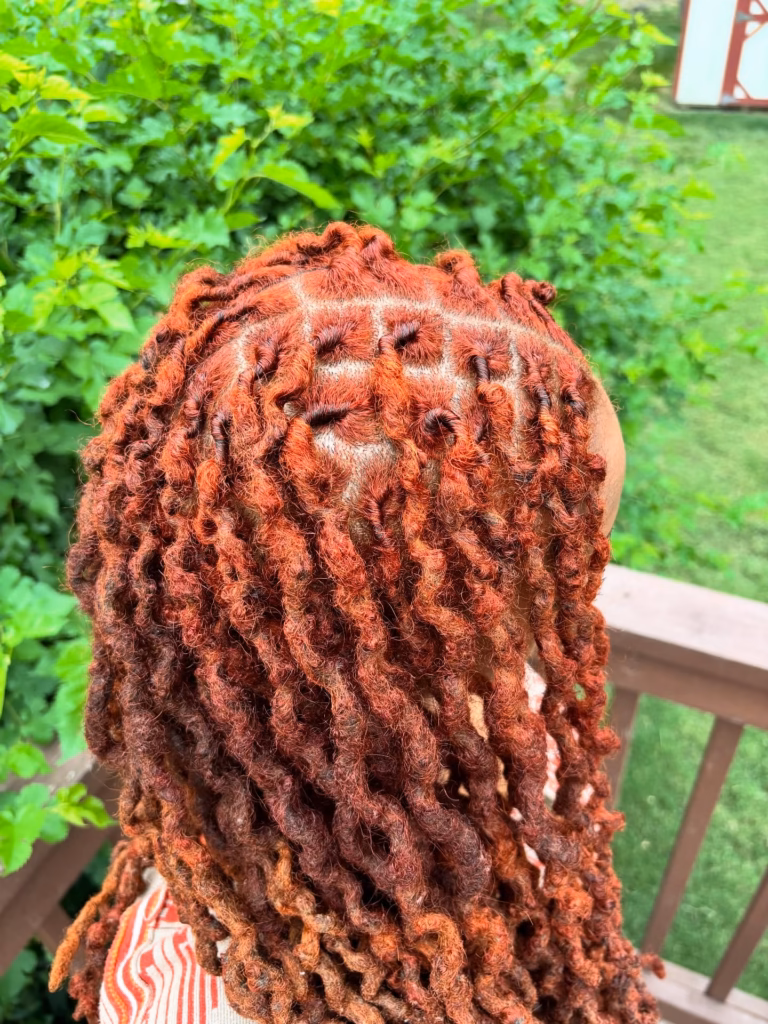 Rust Red Curly Faux Locs with Grid Sections