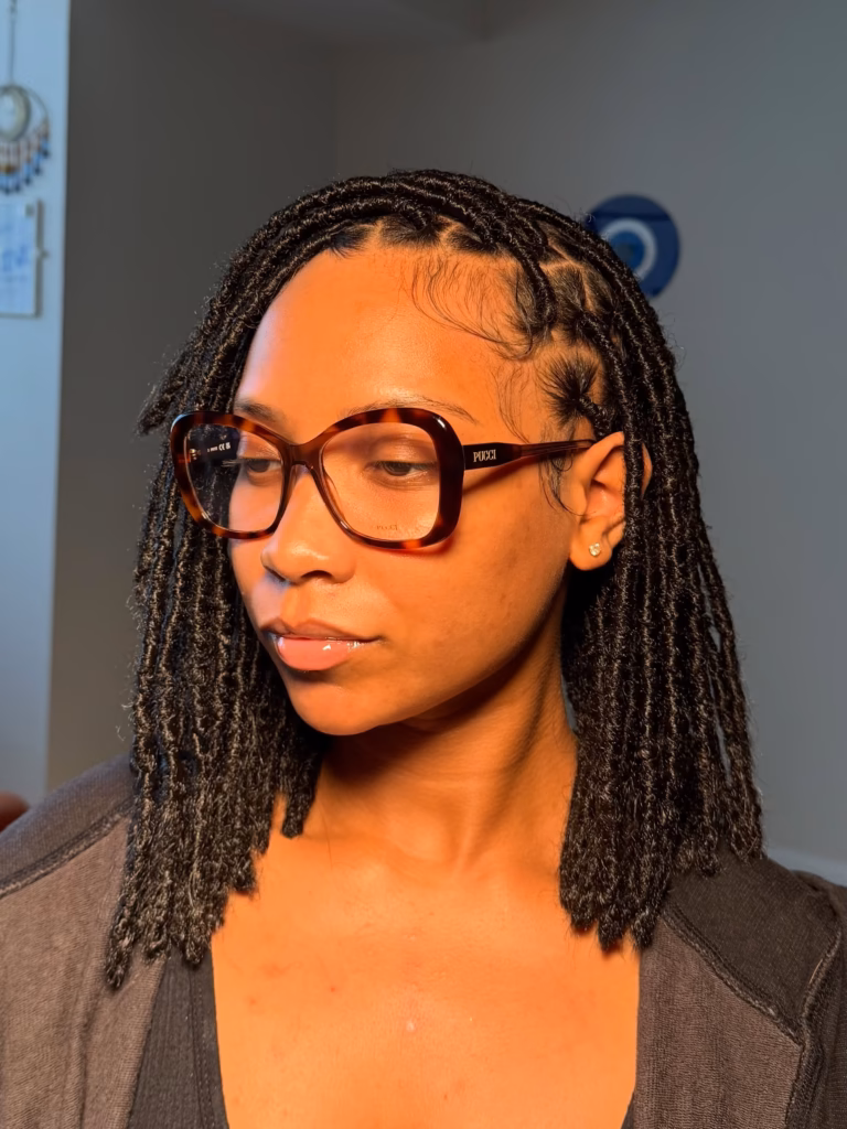 Shoulder-Length Locs with Salt-and-Pepper Highlights