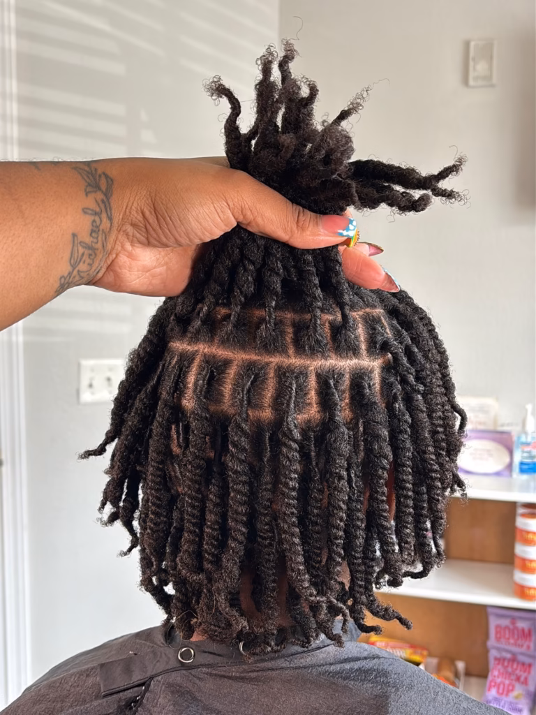 Two-Strand Starter Locs with Curly Fringe on Top